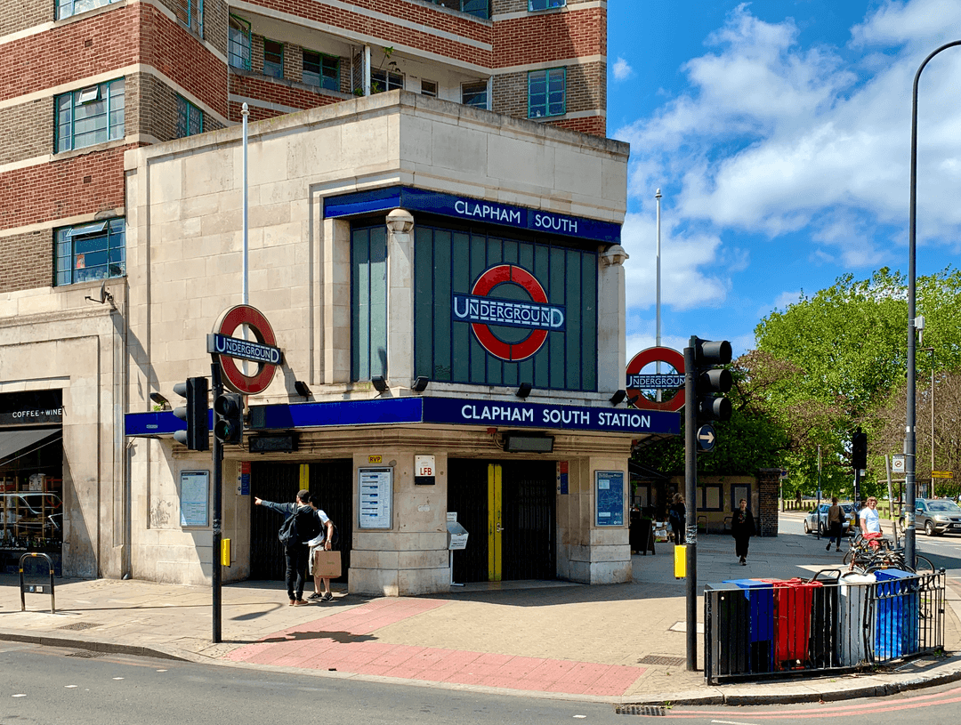 Clapham South Underground station entrance on a bright sunny day with the iconic roundel sign above the entrance